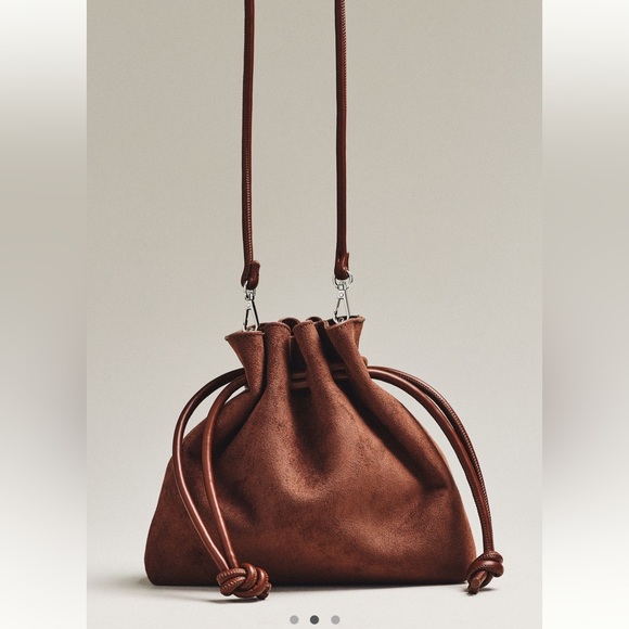 Anthropologie Handbags - Cinched Suede Faux Fur Bucket Bag